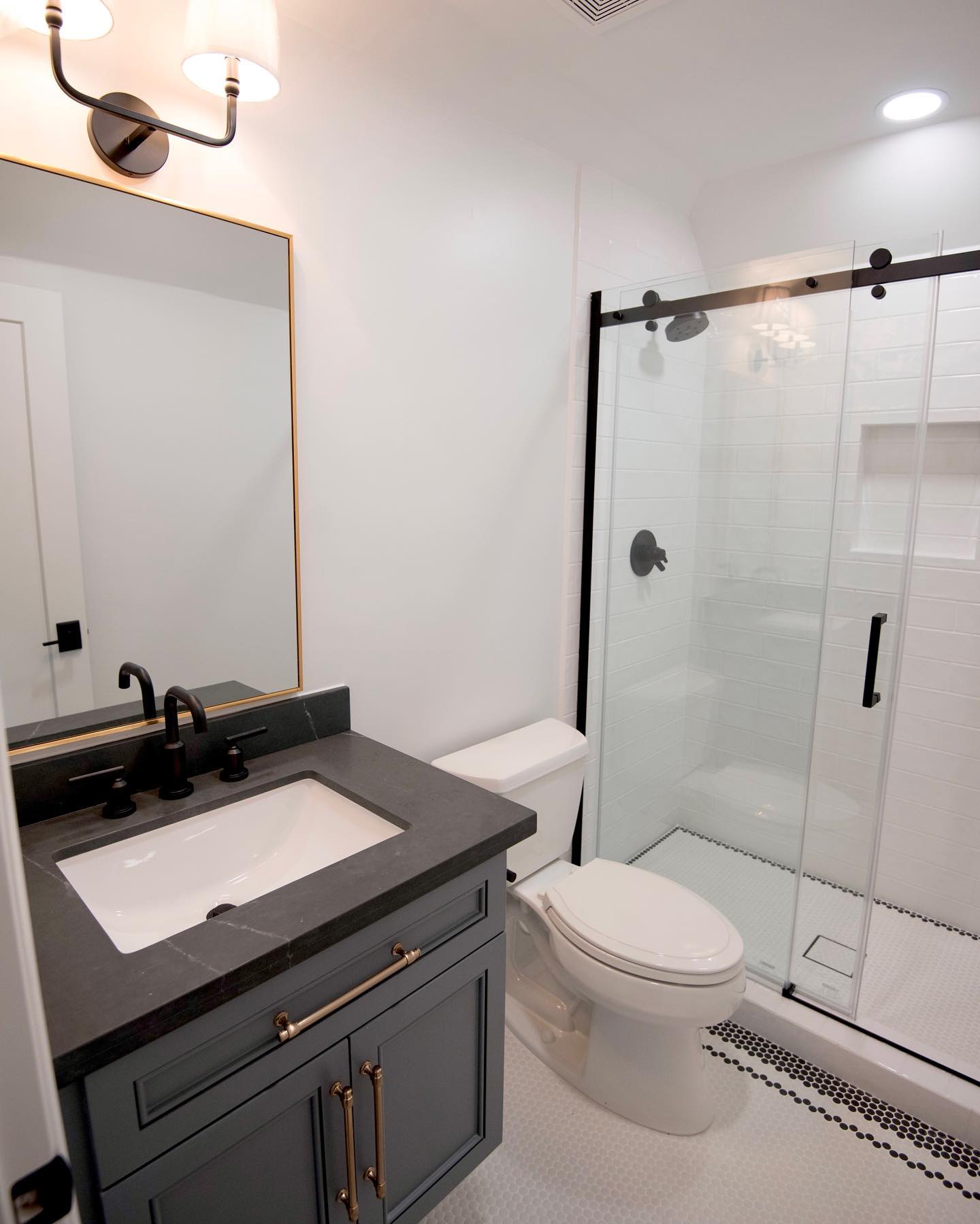 Modern bathroom renovation with walk-in shower and custom vanity Custom Bathroom Remodel by Tranquil Blu
