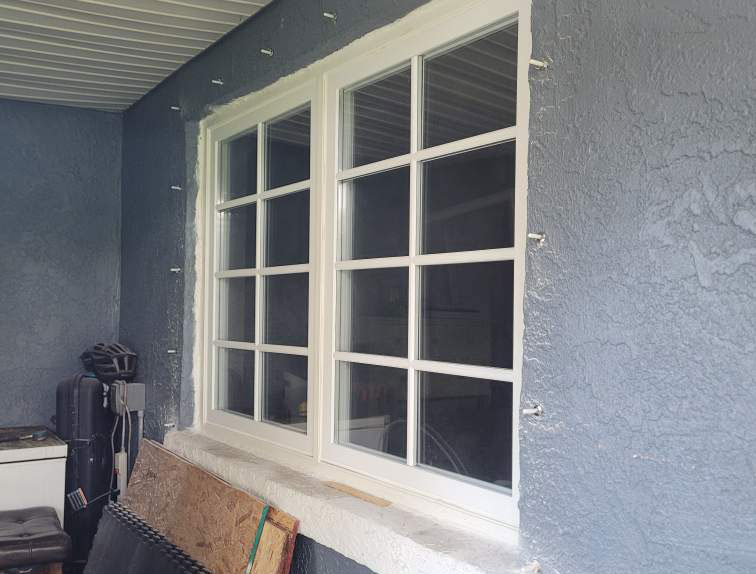 Impact-rated window and door replacement by Tranquil Blu Window and Door Installation Services